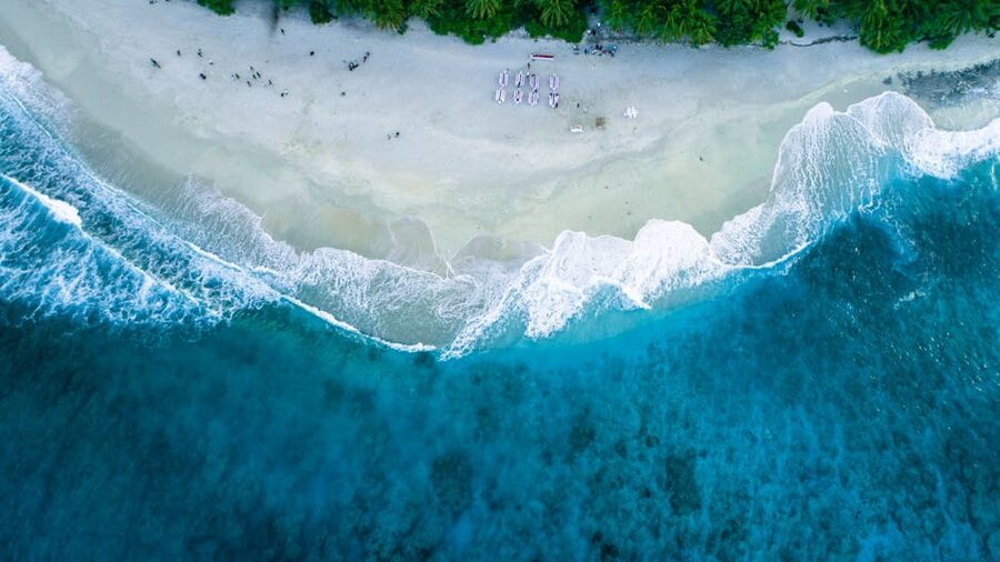 Aerial view of a tropical coastline with turquoise waters