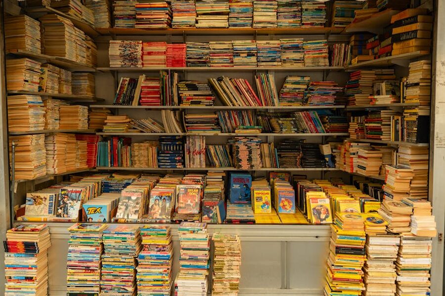 Colorful books stacked and displayed on shelves in an Italian bookstore