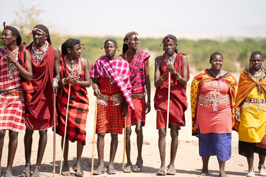 Maasai people in traditional attire on the Kenyan plains