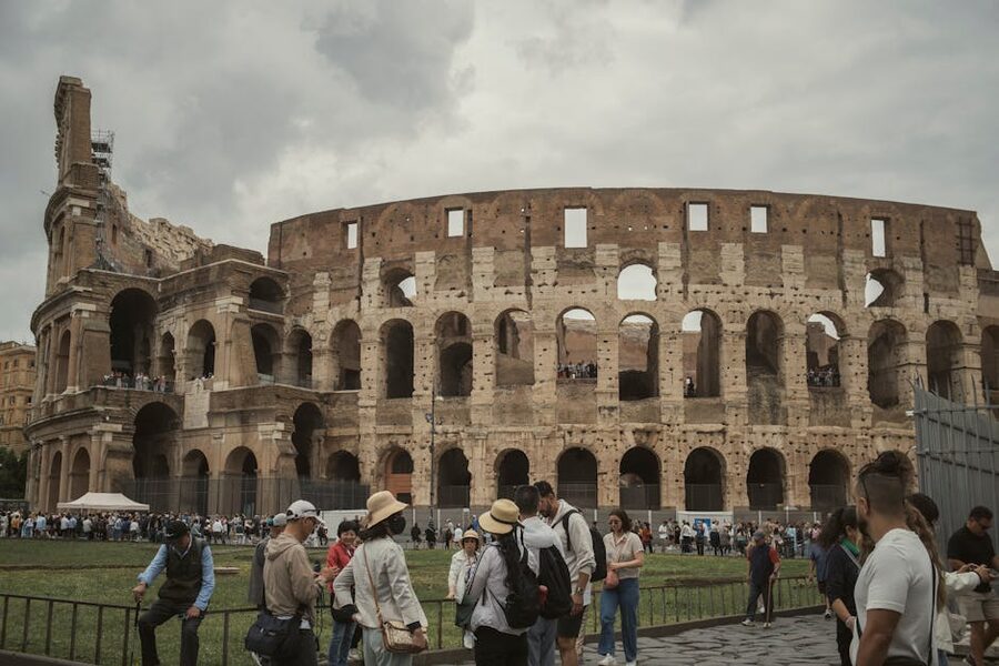 Tourists gathered outside the Colosseum in Rome, an example of pressure from heavy visitor numbers